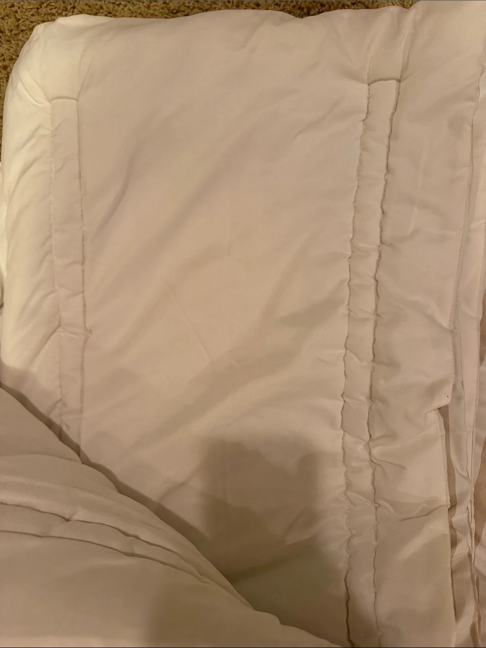 Tan and white striped comforter,  Twin